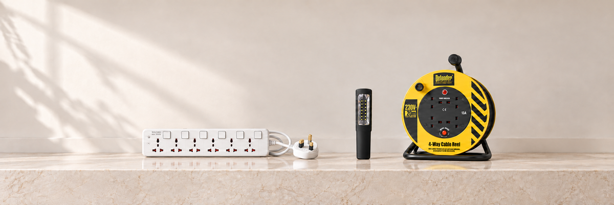 White Macro extension socket with correctly coloured three-pin plug, Seapex work light and Defender cable reel